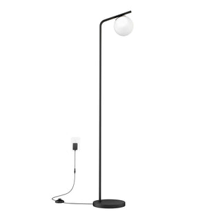 The Artika Clayton dimmable LED modern mid-century floor lamp features a slim black pole with a round base, a spherical white shade, and includes a foot switch on its black cord for easy control.