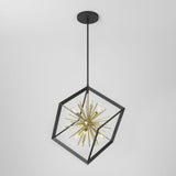 A modern pendant light featuring a gold sputnik-style fixture with exposed bulbs, suspended inside a tilted black metal cube frame against a plain white background.