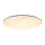 A round, ceiling-mounted LED light fixture with a white frame and a textured, illuminated surface, glowing softly.