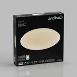 A black box with a picture of an oval LED ceiling light on the front and the brand name artika. Product details include Empress, 50,000-hour lifespan, 1200 lumens, 15-inch size, and 3-year warranty.