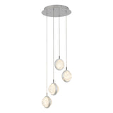 Modern ceiling pendant light with four round, textured glass discs suspended at varying heights from thin wires, attached to a circular metal ceiling plate. The discs appear illuminated.