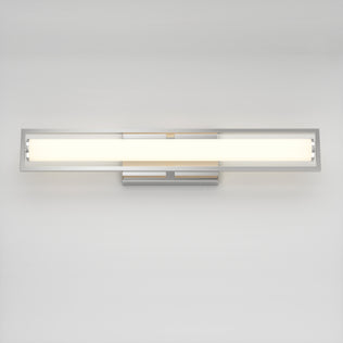 The Artika Rialto modern LED bathroom vanity light 3 CCT features a sleek rectangular design with a frosted glass cover, emits soft, even light, and offers dimmable, adjustable brightness for customizable ambiance.