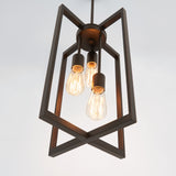 A geometric pendant light fixture with three exposed Edison bulbs, featuring a dark metal frame in an angular, open design, hanging from the ceiling against a plain white background.