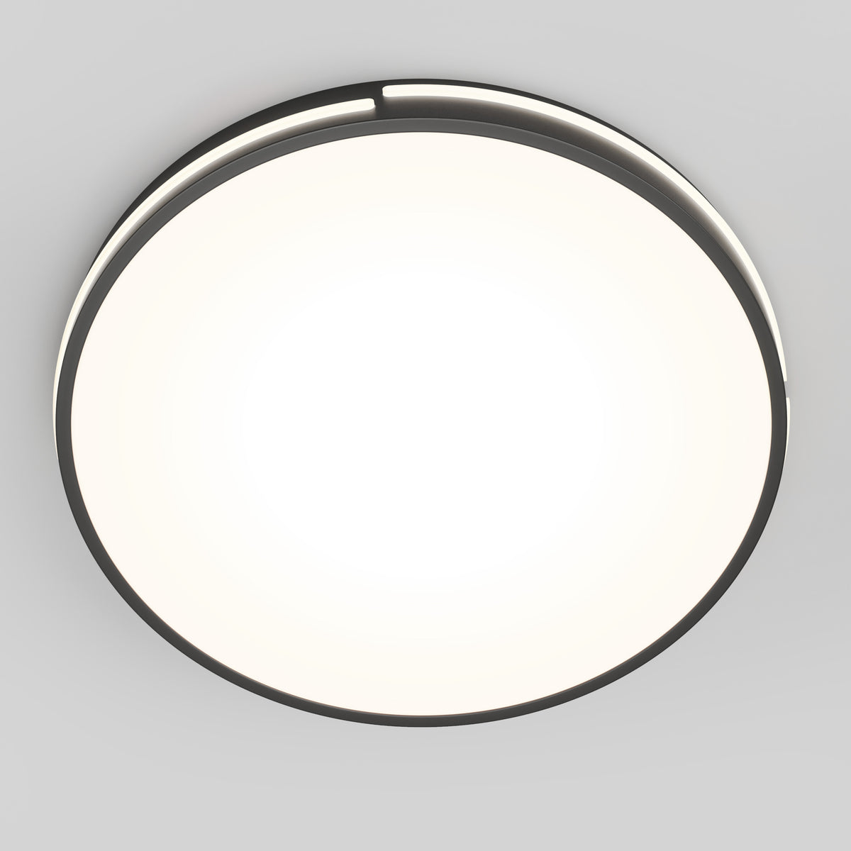 The Artika Delray 15.7 in. LED modern flush mount light features a round design with a black rim and bright white center, seamlessly mounted on a light gray ceiling.