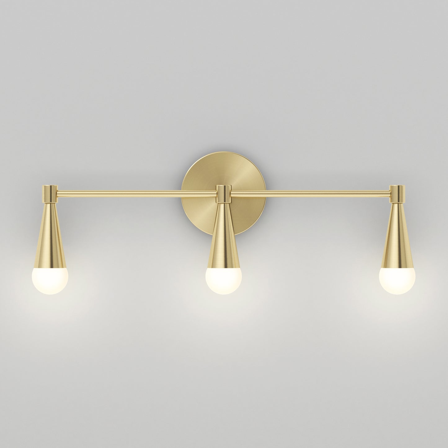 The Artika Wayden LED mid-century bathroom vanity light features three cone-shaped arms with frosted bulbs, all mounted on a round backplate and shown against a plain light gray wall.