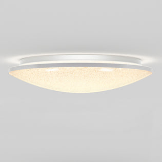 The Artika Sparkle LED flush mount light, featuring a modern white dome design and textured surface, emits a soft, even glow on any ceiling. Includes remote control for effortless adjustment.