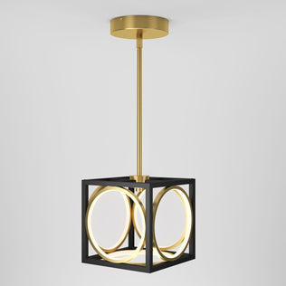 The Astoria LED modern pendant light by Artika features a gold rod and canopy, a black cubic frame, and glowing circular LED rings, suspended against a plain white background.