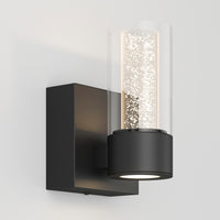 The Artika Essence 1-light LED bathroom vanity light features a dimmable black base and bubble-glass shade for accent lighting.
