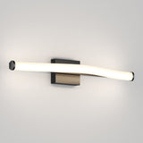 A modern wall-mounted light fixture with a wavy, horizontal, tubular LED light attached to a rectangular metal base on a plain light-colored wall.