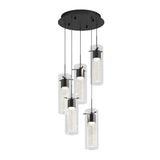 A modern ceiling pendant light with five cylindrical glass shades hanging at different heights from a round black base, featuring metallic accents and illuminated interior rods.