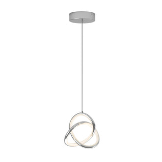 The Artika Zephyr LED pendant features three interlocking metal rings with integrated LED lights, suspended from a round ceiling mount by a single cord.