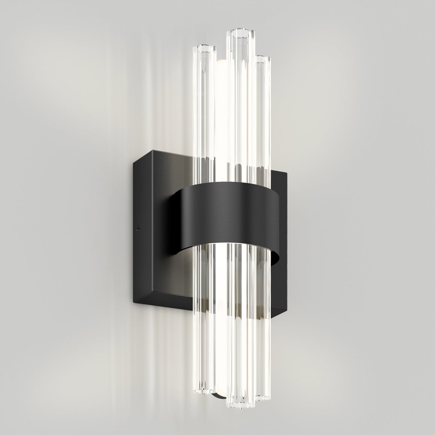 The Dorado LED contemporary wall sconce by Artika features a black rectangular base, curved band, and vertical clear glass rods that diffuse light, shown mounted on a light gray wall.