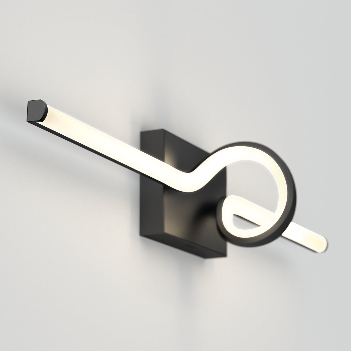 A modern wall sconce with a black rectangular base and a sleek, curved LED light fixture forming a loop design, mounted on a plain white wall.
