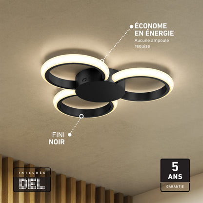 The Artika Nyala 15 in. LED flush mount light features four black circular rings, installs on a beige ceiling, offers 5 selectable color temps, integrated energy-efficient LEDs (no bulb needed), a sleek black finish, and a 5-year warranty.