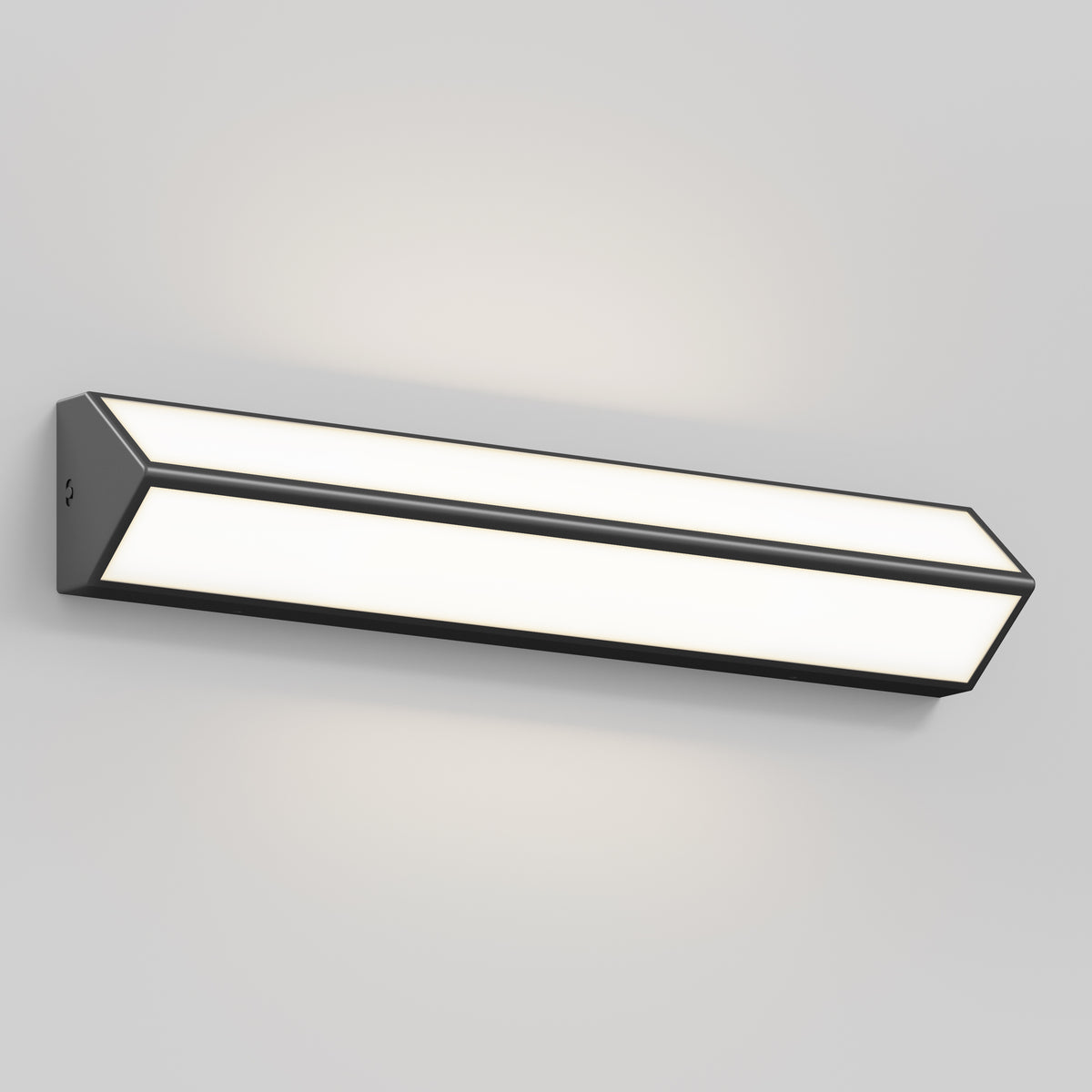 A modern, rectangular wall-mounted light fixture with a black frame and white illuminated panels, emitting a soft glow against a light gray wall.