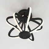 A modern ceiling light fixture with black curving arms and integrated white LED strips, forming an abstract, flowing design against a white ceiling.