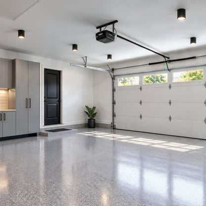 Five black circular Artika Radius 5 in. (12 cm) Modern LED Flush Mount Ceiling Light 3 CCT fixtures installed in a garage.