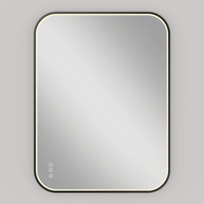 The Artika Royce dimmable LED mirror 3 CCT features a rectangular design with rounded corners, a soft LED frame, and three touch buttons on the lower left. Its wall-mounted against a plain light gray background.