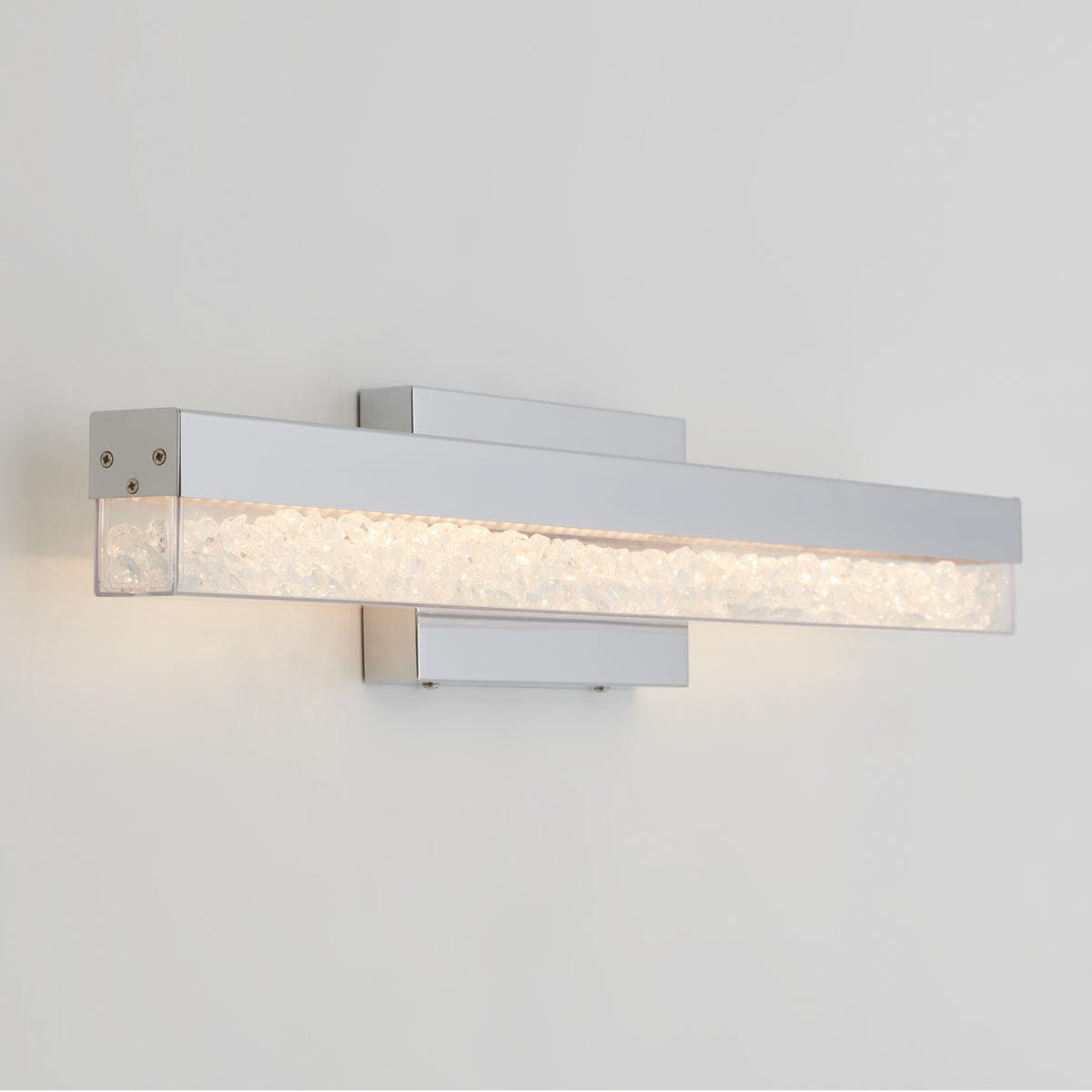 Artika Riviera modern LED bathroom vanity light features a chrome finish and textured illuminated glass bar for your bathroom.