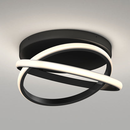 The Artika Orbia modern LED flush mount light features two intersecting circular bands—one glowing white, one matte black—mounted on a round black base, offering 3 CCT options for a sleek look against any ceiling.