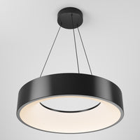 The Aiden LED pendant light by Artika features a modern black circular design suspended by three cables, with a wide ring shape and soft, diffused white illumination from within.