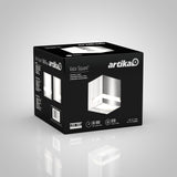 A black box features the Artika Valor Square LED wall light, showing images and specs of the square-shaped fixture. The box highlights its 50,000-hour lifespan and 830 lumens, with text and product details on multiple sides.