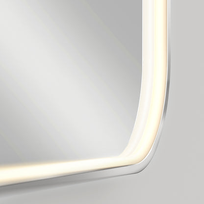 Close-up of the Artika Royce dimmable LED mirror 3 CCT, a rectangular mirror with rounded corners and an integrated edge LED light strip, reflecting a soft, neutral background.