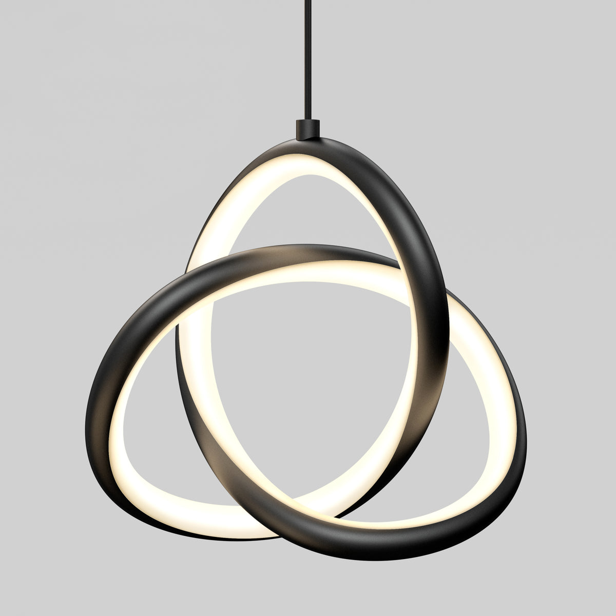 A modern pendant light with two black, interlocking, oval-shaped LED rings suspended from a black cord against a plain gray background. The rings emit a soft, white glow.