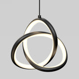 A modern pendant light with two black, interlocking, oval-shaped LED rings suspended from a black cord against a plain gray background. The rings emit a soft, white glow.