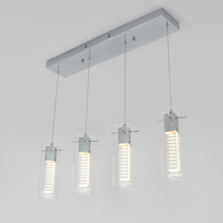 The Artika Hologram 4-light LED pendant features four cylindrical glass lights hanging from a rectangular metallic base, each with an LED bulb, and is shown mounted on a white ceiling.