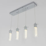 A modern ceiling light fixture with four cylindrical glass pendants, each containing a vertical array of LED lights, hanging from a rectangular chrome base.