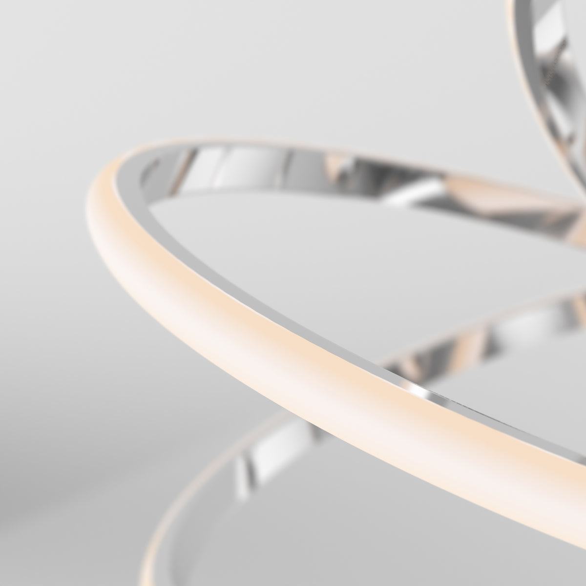 Abstract image of intertwined metallic and glowing rings on a light gray background, with a soft focus and modern, minimalistic aesthetic.