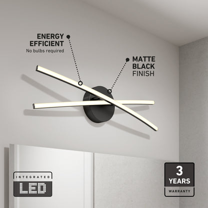 The Artika Orly modern LED bathroom vanity light 3 CCT features two curved, illuminated bars crossing a matte black base. “Energy Efficient,” “Matte Black Finish,” and a “3 Years Warranty” badge are highlighted in the image.