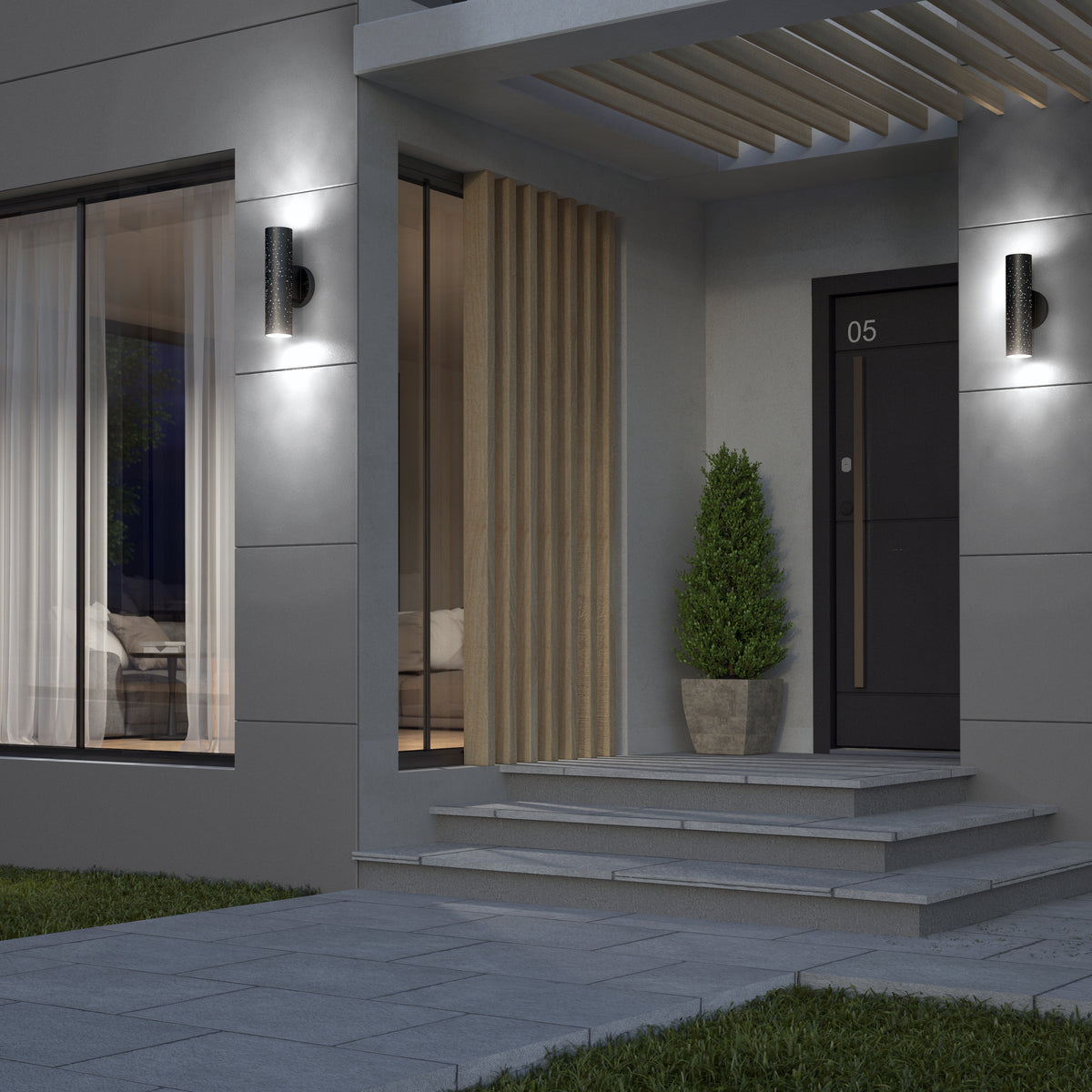 Modern house entrance at dusk with a black door labeled “05,” two wall lights, a potted evergreen shrub on the steps, large windows with sheer curtains, and a decorative wood slat panel beside the door.