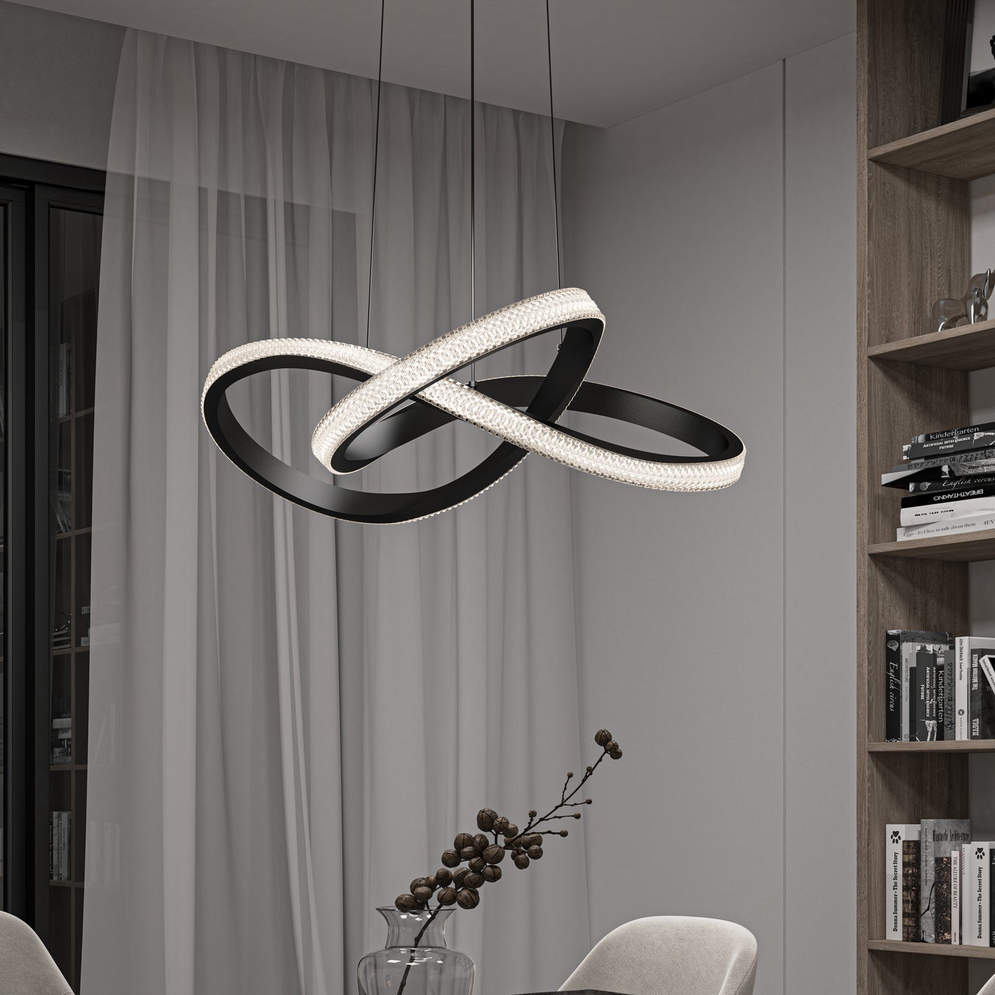 A modern dining room features the Artika Morgan LED contemporary pendant light (5 CCT) as a sculptural centerpiece, sheer curtains, a glass vase with branches, and a bookshelf filled with books on the right.