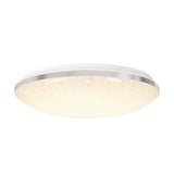 A modern round ceiling light with a textured, glowing diffuser and a slim metallic rim, mounted on a white ceiling base.