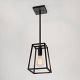 A modern black pendant light fixture with an exposed Edison bulb, featuring a geometric, open metal frame, hanging from a ceiling mount.