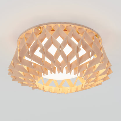 The Artika Kiran 13 in. modern LED flush mount light features a geometric wooden lattice shade that softly diffuses light, adding a warm, modern touch to any white ceiling with its 5 CCT adjustable settings.