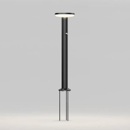 The Artika Urbia Solar LED Bollard features a modern black design with a circular top and three stakes for easy ground installation.