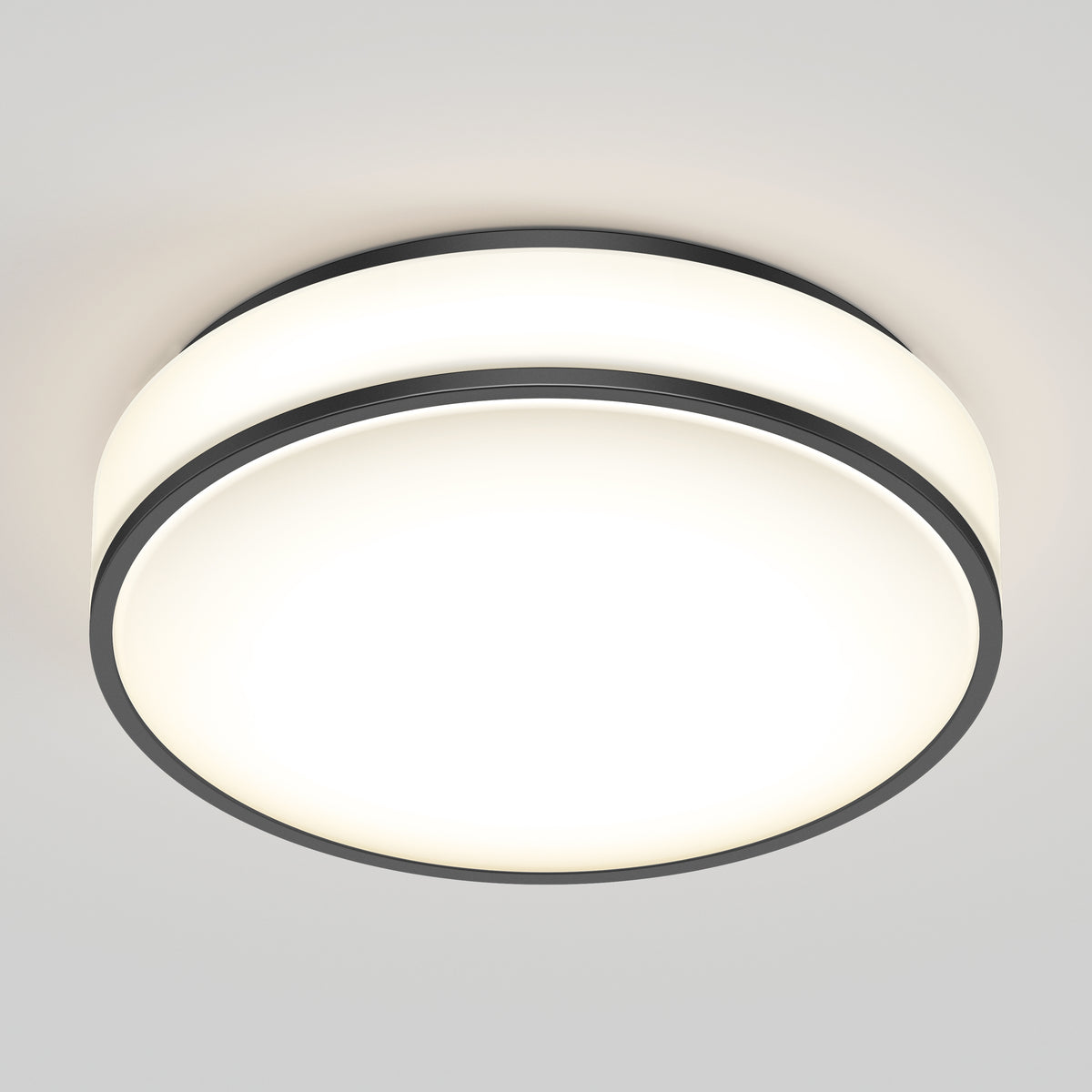 The Artika Giada 15 in. LED modern flush mount light features a white frosted cover and slim black trim, elegantly mounted on a light gray ceiling. Its 5 CCT options make it a versatile choice for contemporary spaces.