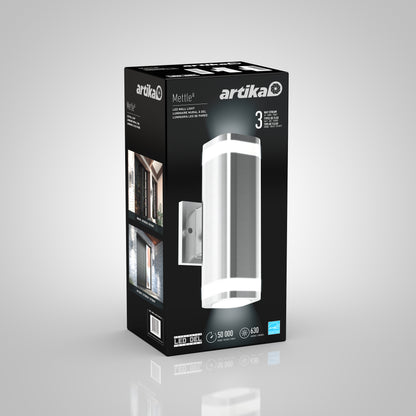 A black box for the Artika Mettle LED indoor-outdoor wall light displays images of the fixture in use and key details: 50,000-hour lifespan, 630 lumens brightness, and a three-year warranty.