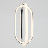 A modern pendant light with two intersecting oval LED loops, emitting a soft white glow, suspended against a plain light gray background.