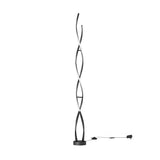 A modern floor lamp with a twisted, spiral design featuring two interwoven black and white LED light strips on a round black base. A power cord and switch are visible on the right side.