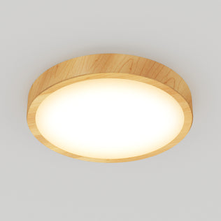 The Artika Dryad 15 in. LED Modern flush mount light features a wooden frame and frosted white cover, ceiling-mounted and glowing brightly against a plain white ceiling.