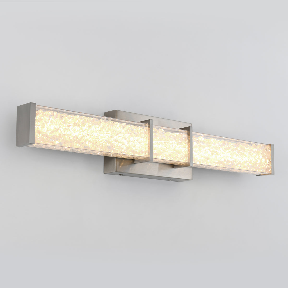 Artika Royale 27-in Integrated LED Vanity Light Bar with textured glass and metallic base, shown on a light gray bathroom wall.