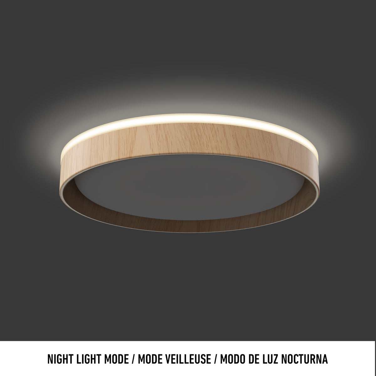 The Artika Callisto 15 in. LED flush mount light features a wooden frame and soft glow, shown against a dark background. Text below reads: Night Light Mode / Mode Veilleuse / Modo de Luz Nocturna.