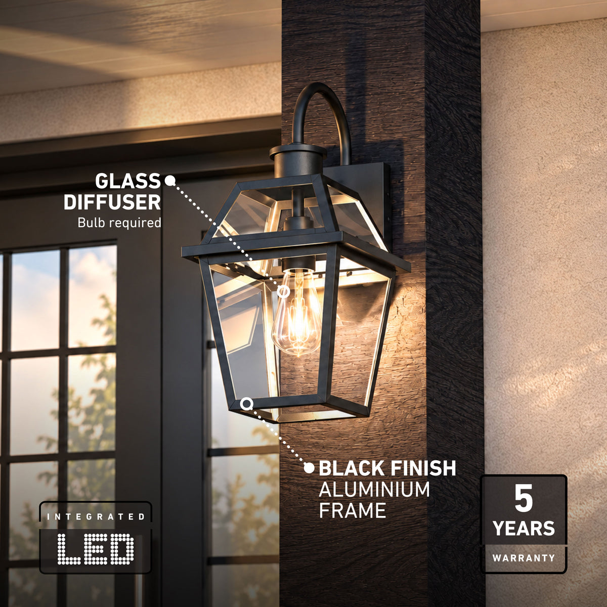 Artika Colonial outdoor lantern with black finish, glass diffuser, exposed bulb, LED icon, and 5-year warranty label on right.