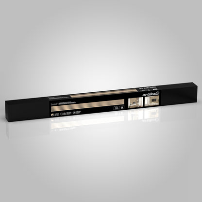 A rectangular black box labeled Artika contains the Sonolok sound-absorbing wall panel kit. The packaging features branding, images, specs, and examples of installed panels on walls or shelves.