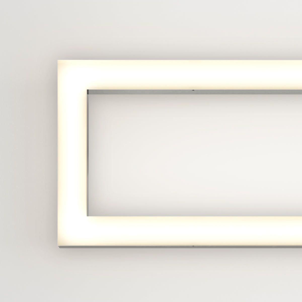 The Artika Dover modern LED bathroom vanity light 5 CCT features a rectangular design with rounded corners, mounted on a plain white wall and emitting a soft, even glow for a sleek, minimalist look.