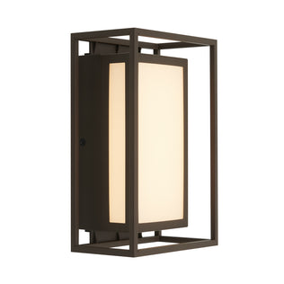 The Artika Ghost indoor-outdoor LED wall light features a modern rectangular metal frame with a bronze finish and a frosted glass panel for soft, diffused illumination.